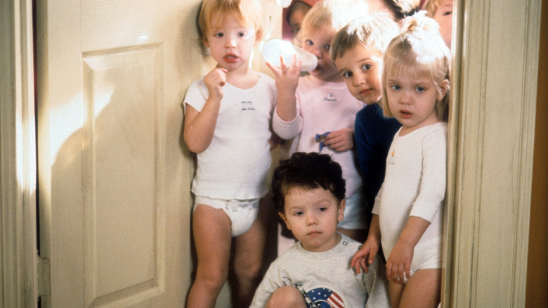 A group of toddlers gather in a doorway in 'Baby Geniuses' (1999)