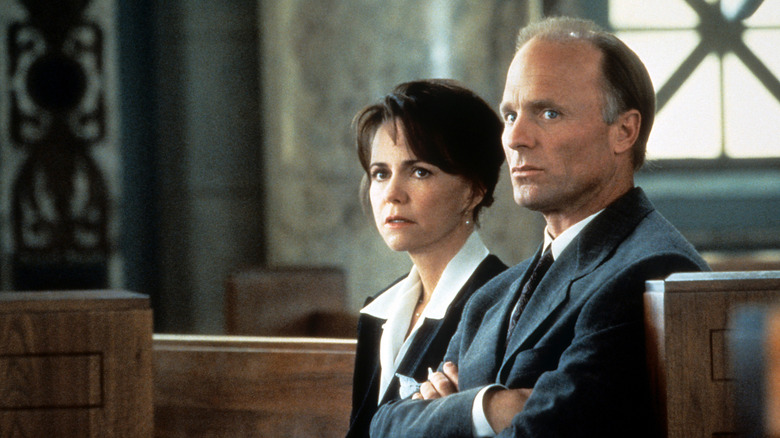 Karen and Mack McCann sit in a courtroom in 'Eye for an Eye' (1996)