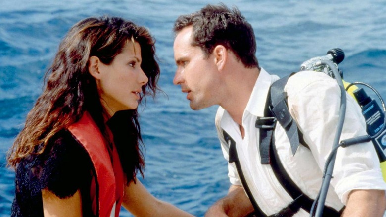 Annie Porter and Alex Shaw float on the ocean in 'Speed 2: Cruise Control' (1997)