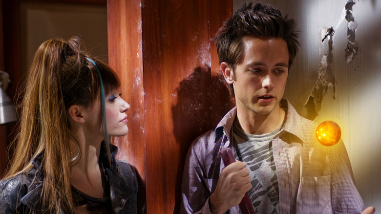 Bulma and Goku consult a dragon ball in "Dragonball: Evolution"