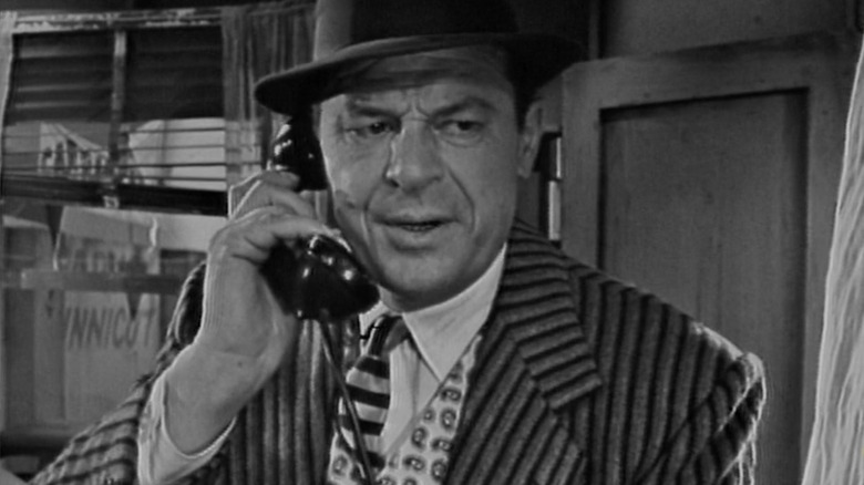 Jack Carson as Hunnicut on the phone at the end of "The Whole Truth" from "The Twilight Zone."