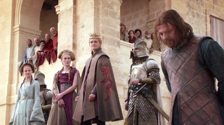 Sansa Cersei and Joffrey looking at Ned Stark on Game of Thrones