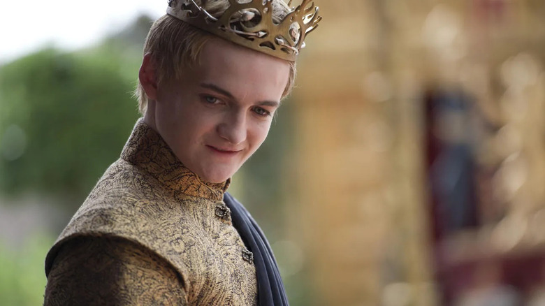 Joffrey wearing his crown looking down at Tyrion on Game of Thrones