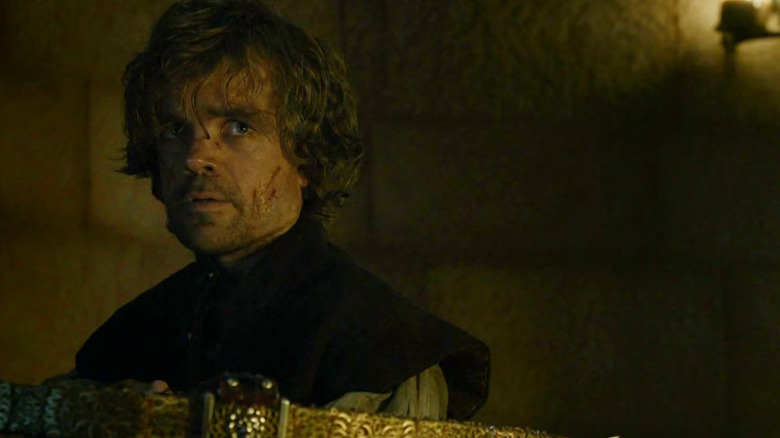 Tyrion holding a crossbow on Game of Thrones