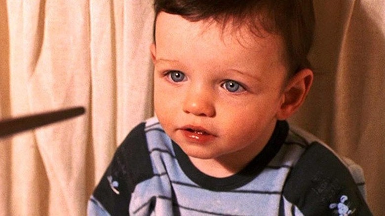 Voldemort's wand aimed at baby Harry in The Sorcerer's Stone