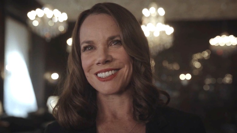 Ann Rutledge smiling in Damien