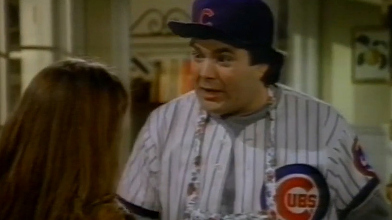 Buck Russell wearing a baseball cap in Uncle Buck