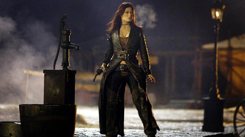 Rayne walking around a Western town in BloodRayne II: Deliverance (2009)