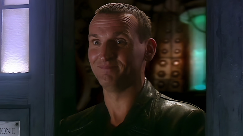 Ninth Doctor grinning uncomfortably