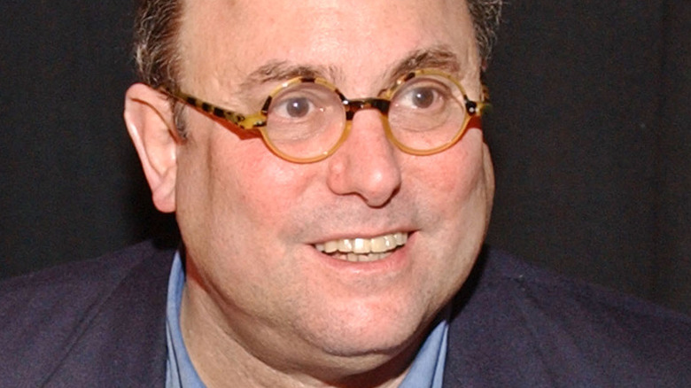 Peter Straub smiling during a book signing