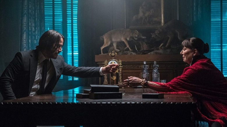 John and the Director in office