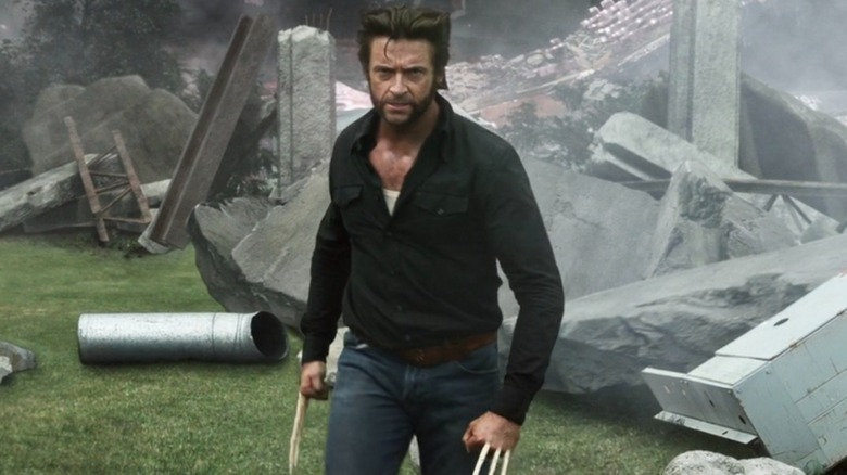 Wolverine holding up his bone claws