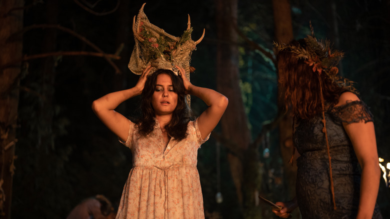 Lottie wearing antler crown next to Shauna