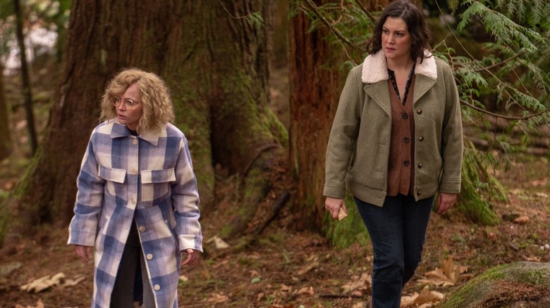 Missy and Shauna search the woods
