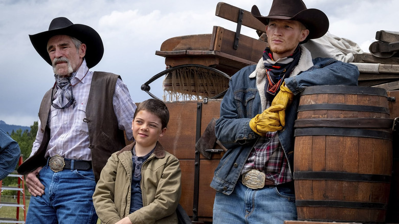 Jimmy, Lloyd and Tate stare in "Yellowstone"