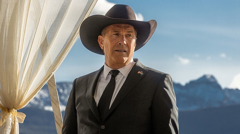 Kevin Costner wearing cowboy hat