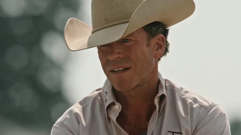 Travis Wheatley in a cowboy hat, staring, in "Yellowstone"