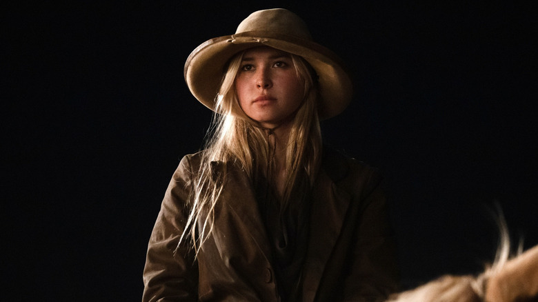 Elsa Dutton wears a hat