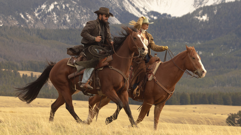Rip and Beth riding horses in "Dutton Ranch"
