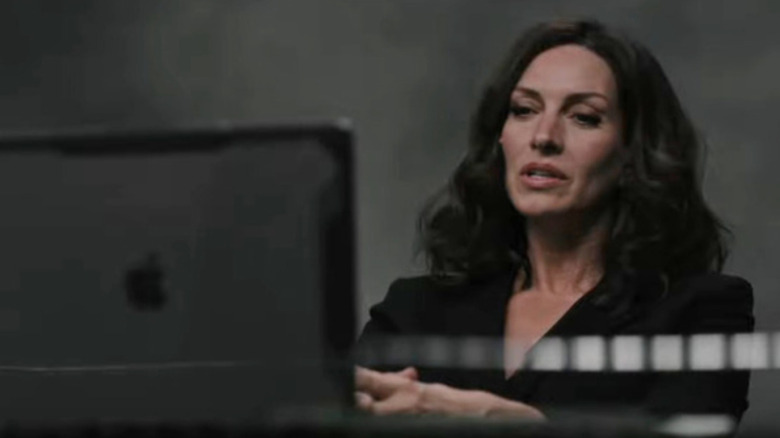 Sarah Atwood watches her and Jamie's tape on "Yellowstone" (2024)