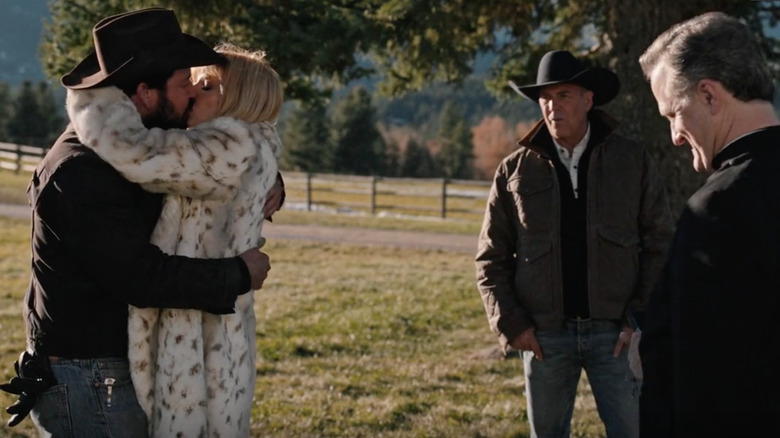 Beth and Rip kiss while John and a priest look on Yellowstone