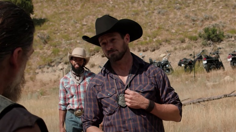 Ryan displaying his livestock badge