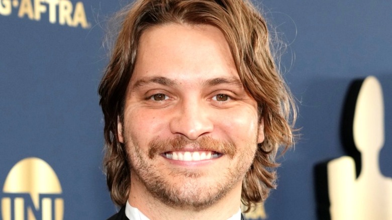 Luke Grimes posing for a photo
