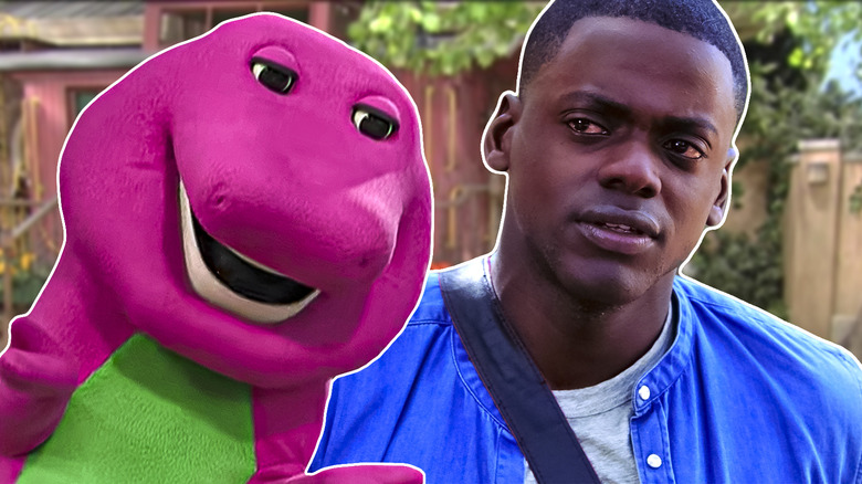 Daniel Kaluuya and Barney the Dinosaur smiling 