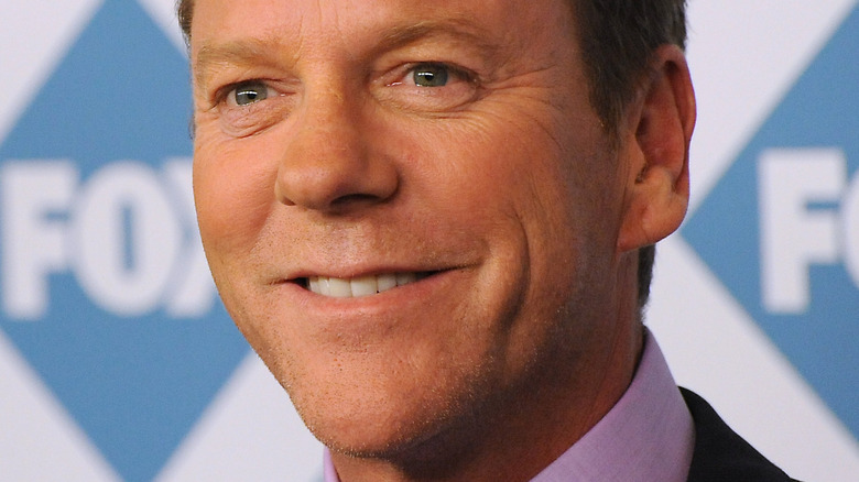 Kiefer Sutherland smiles