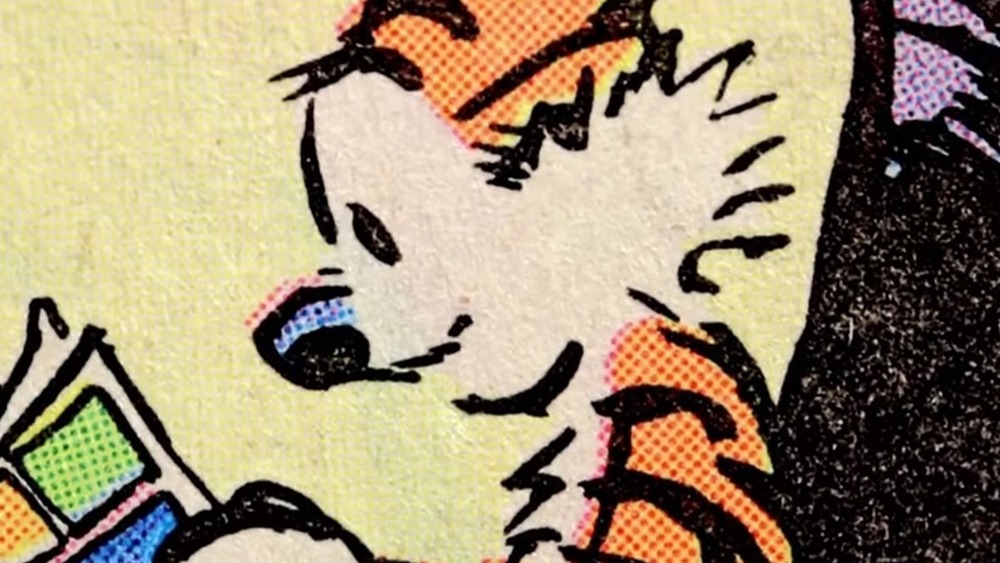 Hobbes reading comics