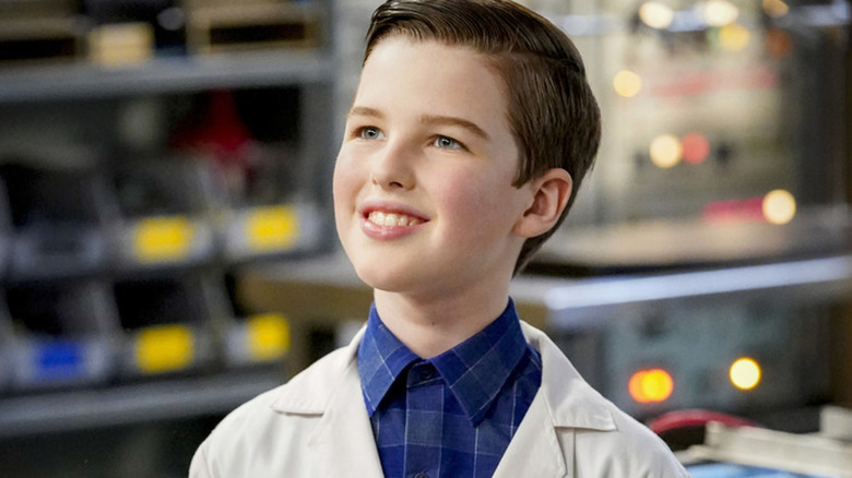 Sheldon smiling in a lab coat in "Young Sheldon" (2017-2024)