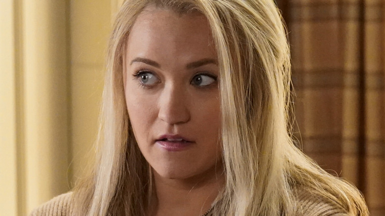 Emily Osment looking to the side