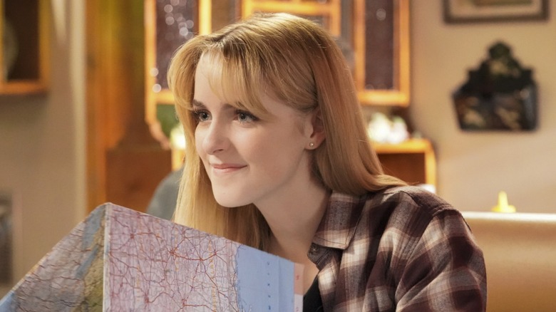 Paige with map in diner