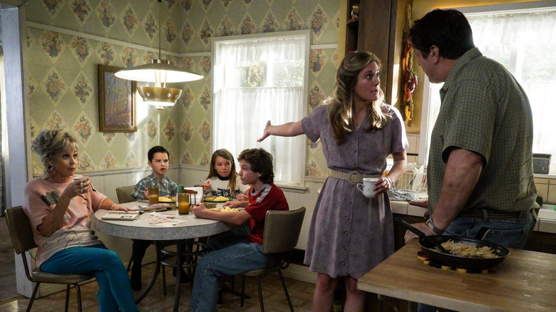 Mary exclaiming to George while the family looks on in "Young Sheldon"