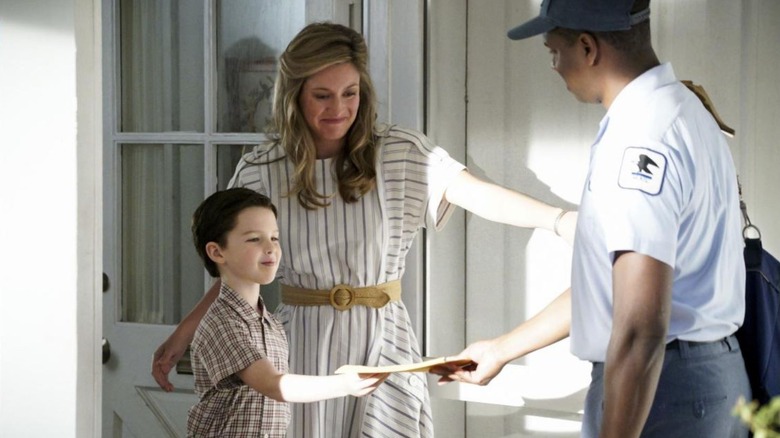 A postman delivering a package to Sheldon and Mary in "Young Sheldon"