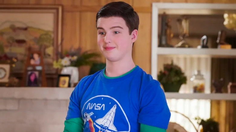 Sheldon forcing a smile