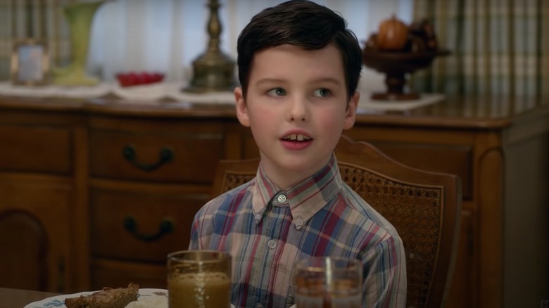 Youngn Sheldon eating dinner