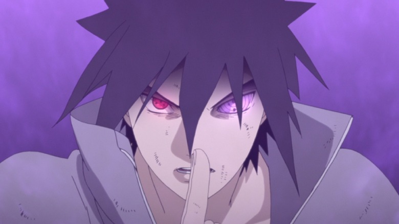 Glaring Sasuke in the middle of a fight