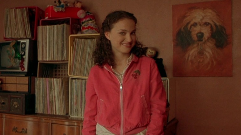 Sam smiling mischievously