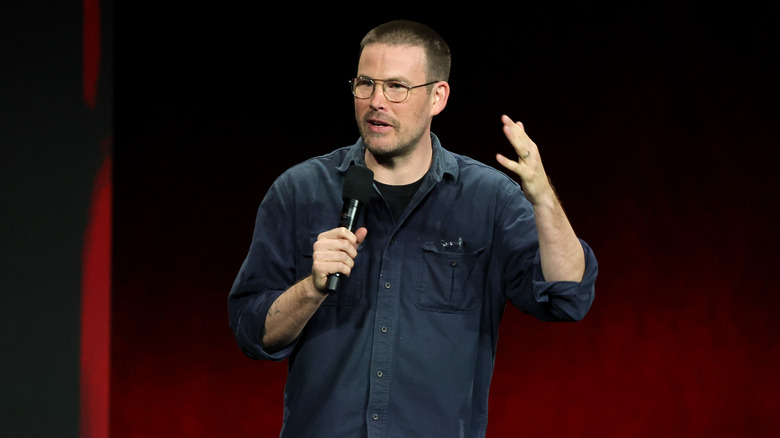 Zach Cregger speaking onstage to promote Weapons