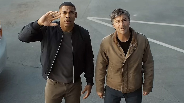 John Stewart and Hal Jordan look up into the sky on "Lanterns" (2026)