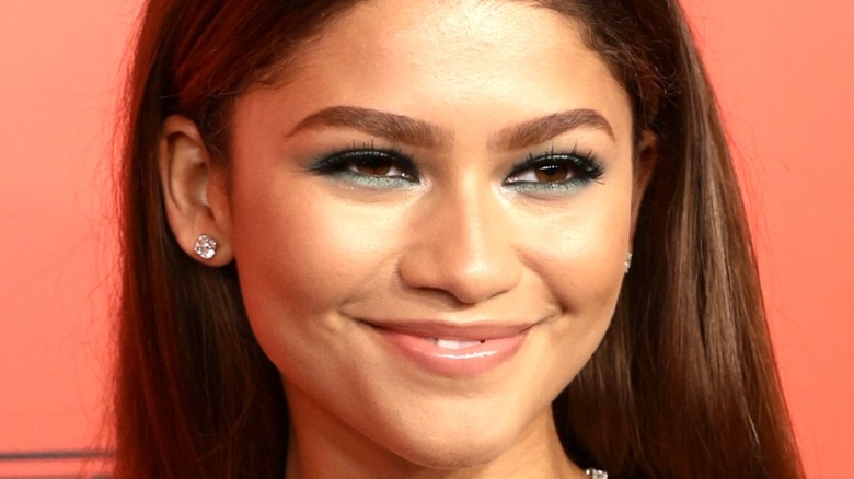 Zendaya smiling at event