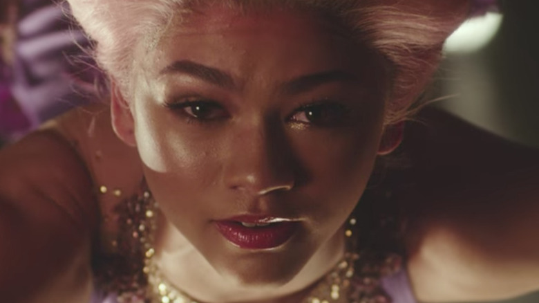 Zendaya on trapeze with pink hair