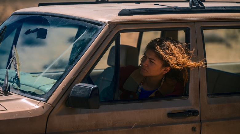 Rue hanging out of a car window on Euphoria