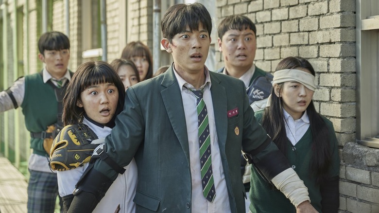 Students fleeing from zombies in All of Us Are Dead