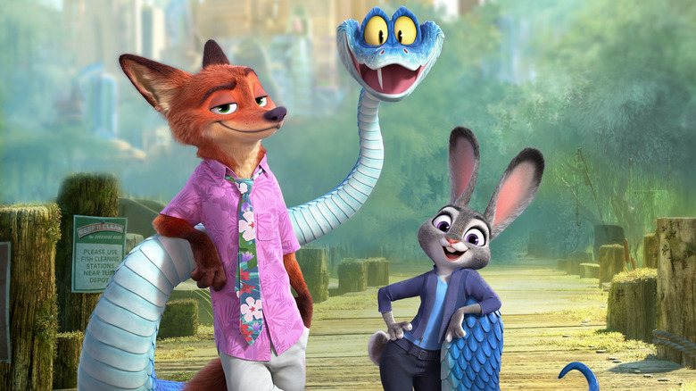 Nick, Gary, and Judy Hopps stand on a pier in 