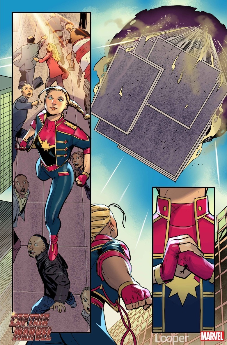 Carol Danvers looks as building falls from the sky
